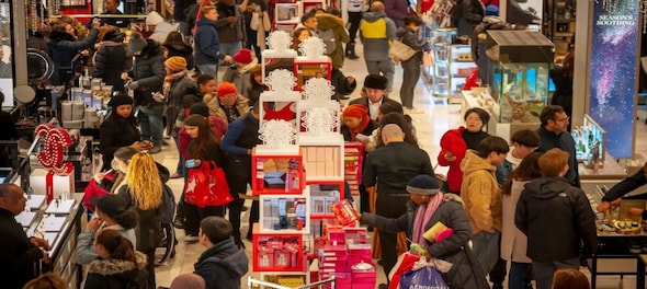 US consumer confidence climbs to a two-year high as inflation drops