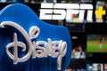 Disney earnings top estimates on cost cuts, theme parks; Shares climb