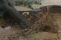 WATCH: Road caves in Chandigarh after tree uprooted in heavy rain; IMD issues red alert