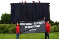 Watch: Greenpeace activists drape British PM Rishi Sunak's house in black cloth over oil policy