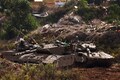 Israel escalates bombardment in Gaza, evacuates near Lebanon