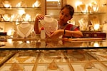 Gold hovers near one-month peak on slowing US inflation