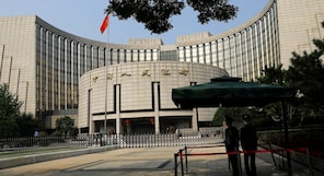 China leaves key rates unchanged on currency pressure, liquidity