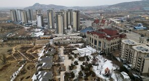 China land sales hit eight-year low as housing slump worsens