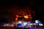 A fire in an apartment building in Hanoi, Vietnam, kills 14 people and injures 3, state media say