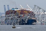 Ship was undergoing engine maintenance before it crashed into Baltimore bridge, Coast Guard says