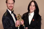 Billie Eilish, Mark Ruffalo, other celebs wear red pins at Oscars 2024 red carpet - what it means