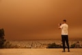 Stunning pictures of Greece turning orange from a Sahara sandstorm