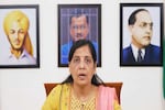 Wall behind Kejriwal's wife in new video grabs eyeballs, 'Delhi CM in jail' photo put up with Bhagat Singh & Baba Saheb