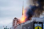 Copenhagen's historic stock exchange engulfed in flames, spire collapses