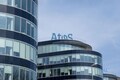 Billionaire Daniel Kretinsky, OnePoint make bailout offers for tech company Atos